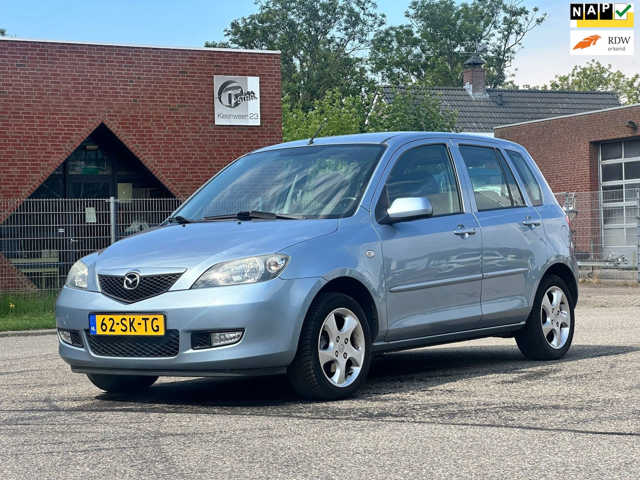 Mazda 2 - 1.4 Touring Airco*Trekhaak*NAP*Parkeersensoren*LM velgen*APK*2e eigenaar* - AutoWereld.nl