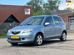 Mazda 2 - 2 1.4 Touring Airco*Trekhaak*NAP*Parkeersensoren*LM velgen*APK*2e eigenaar