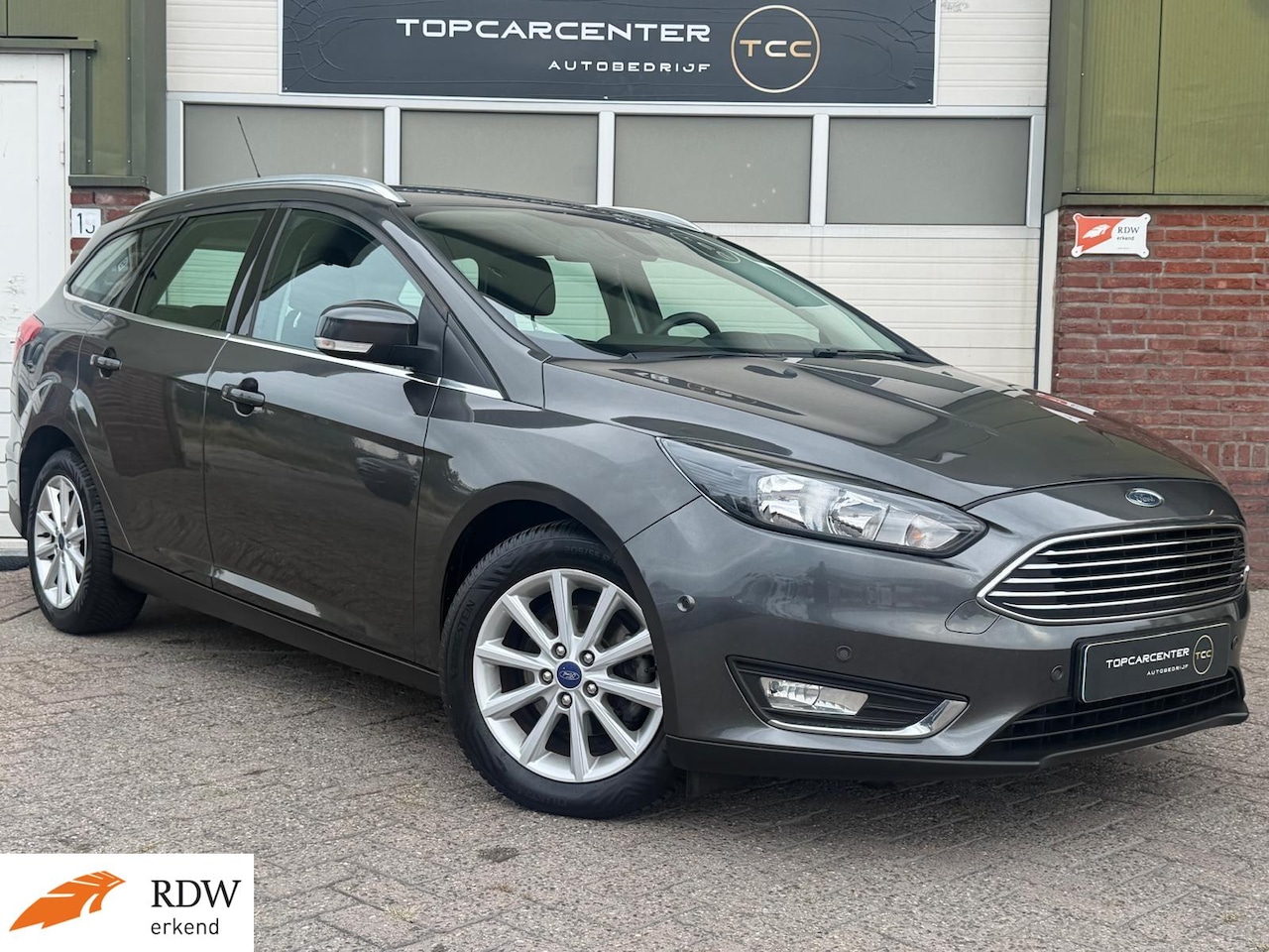 Ford Focus Wagon - 1.0 Trend/AIRCO/AUT/STOELV/PARKS/NAVI/APK - AutoWereld.nl
