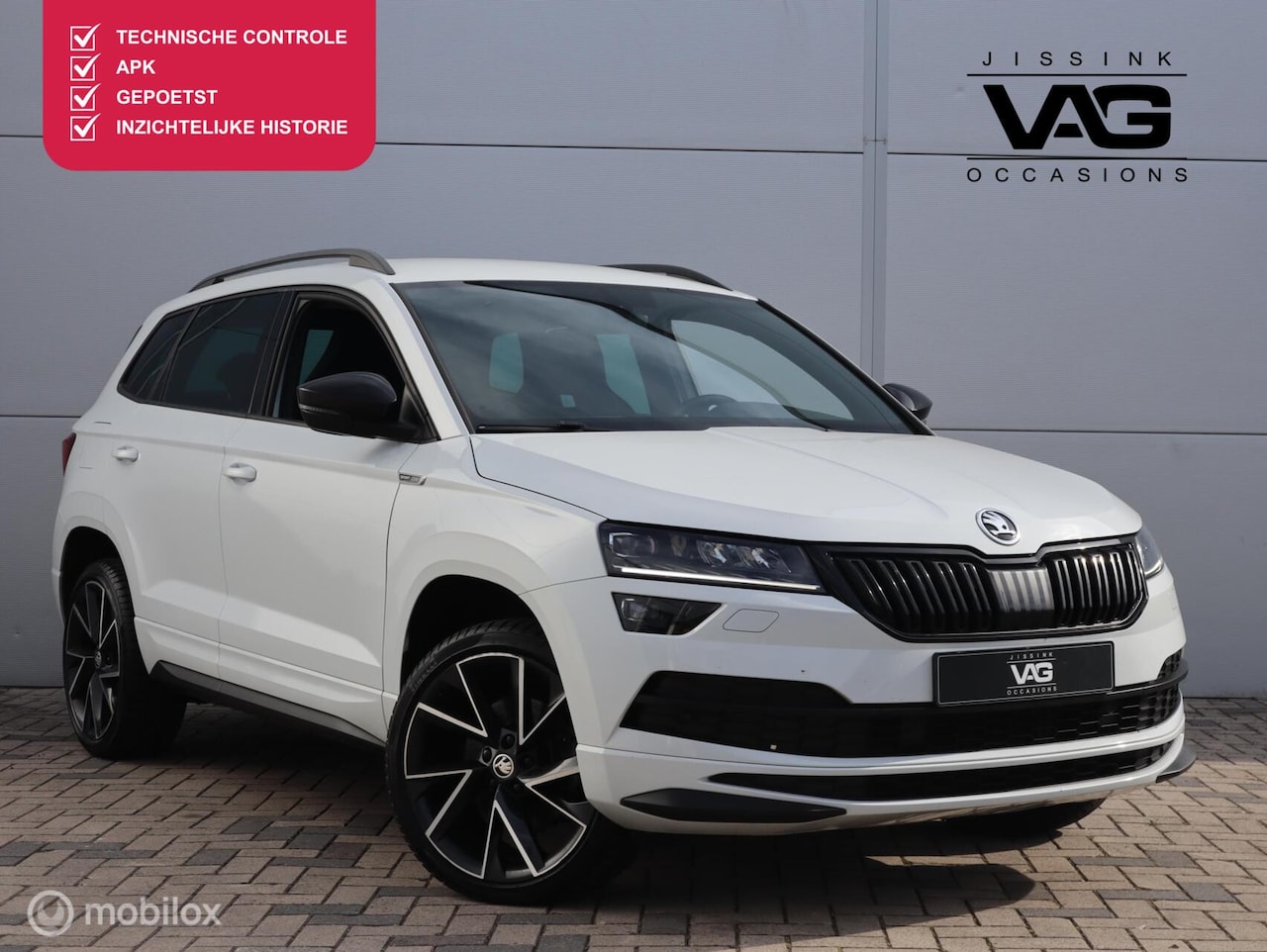 Skoda Karoq - 1.5 TSI Sportline Automaat Trekhaak Canton Camera LED - AutoWereld.nl