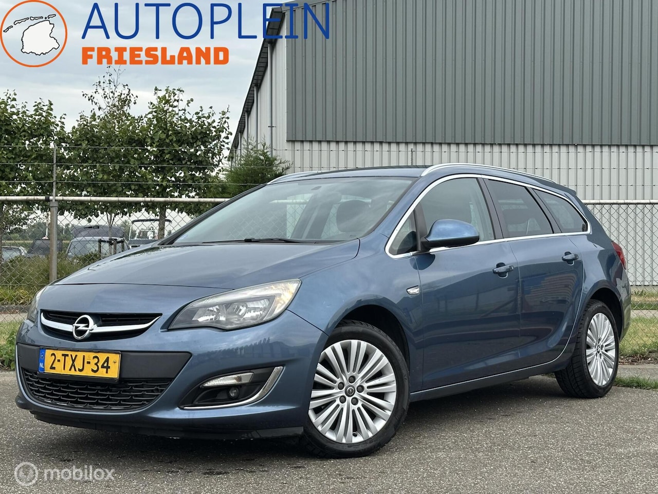 Opel Astra Sports Tourer - 1.4 Turbo Design Edition|APK 5/27 - AutoWereld.nl