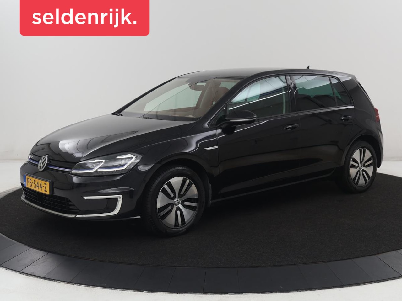 Volkswagen e-Golf - | SOH 91.3% | Leder | Dynaudio | Stoelverwarming | Adaptive cruise | Carplay | Navigatie | - AutoWereld.nl