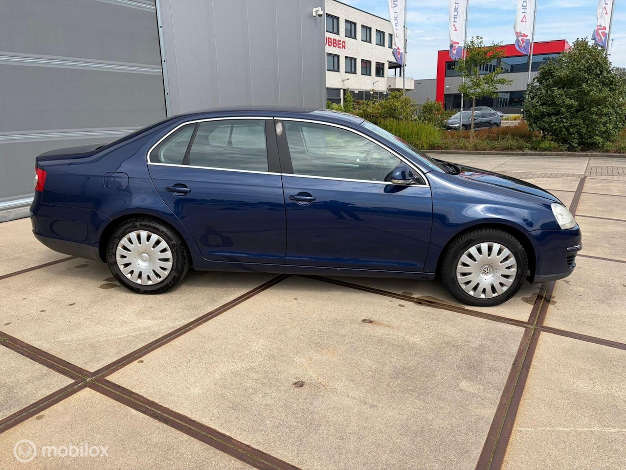 Volkswagen Jetta - 1.6 FSI Sportline Apple carplay - AutoWereld.nl
