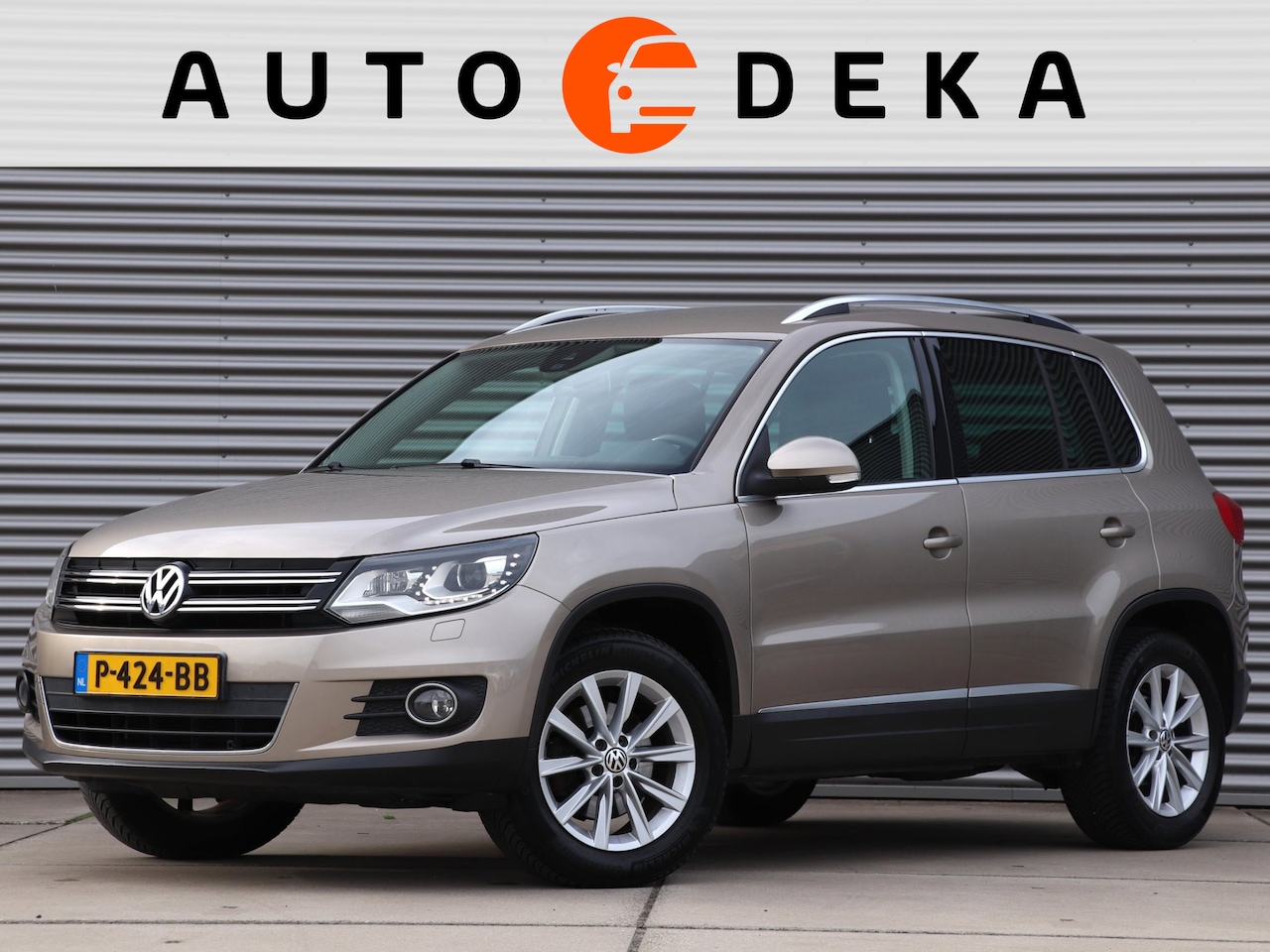 Volkswagen Tiguan - 1.4 TSI Sport&Style 4Motion *Navigatie*Stoelverw.*Camera* - AutoWereld.nl