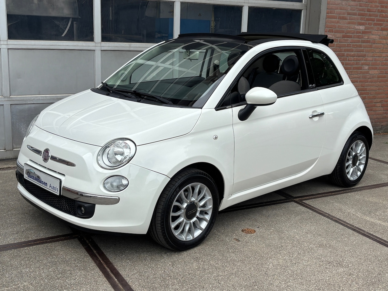 Fiat 500 C - 1.2 Lounge 1.2 Lounge,4 cil,AIRCO,LMV,HALF LEER,SPORT STOELEN,NIEUWSTAAT - AutoWereld.nl