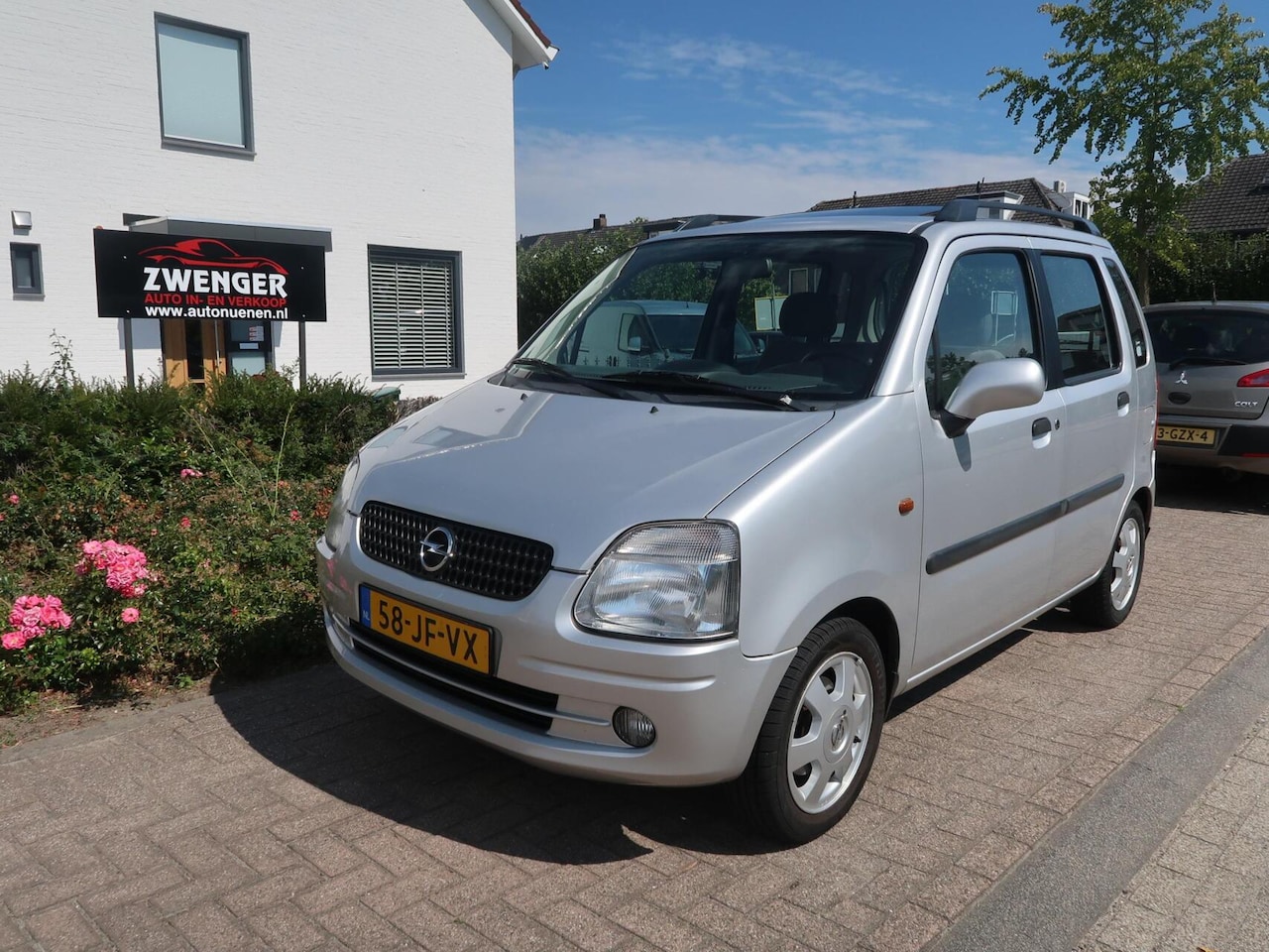 Opel Agila - 1.2-16V SCHUIFDAK|TREKHAAK|BLUETOOTH|STUURBEKRACHTIGING|GOED ONDERHOUDEN - AutoWereld.nl