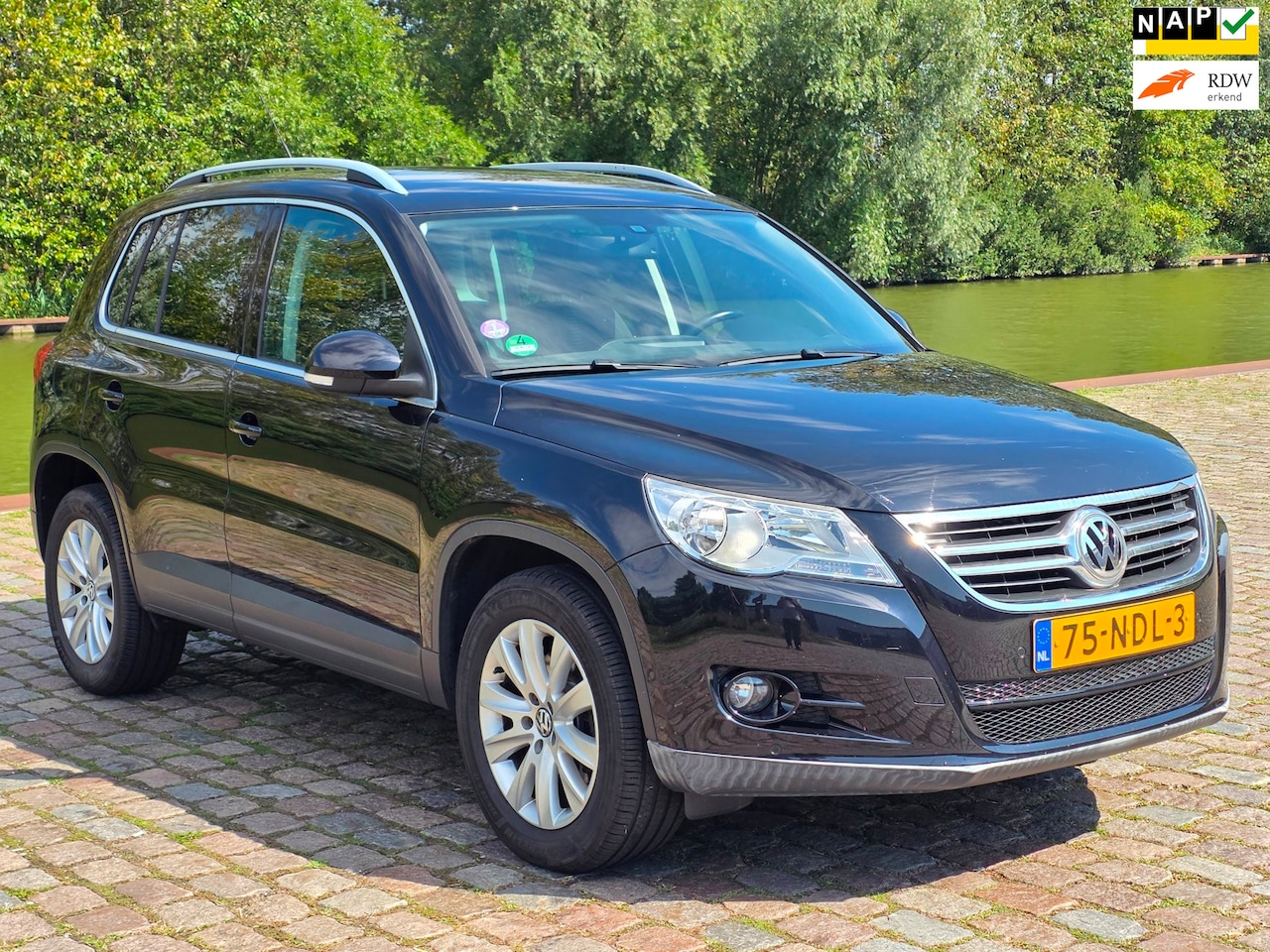 Volkswagen Tiguan - 1.4 TSI Sport&Style 1e eigenaar dealer onderhouden navigatie cruis control parkeer sensor - AutoWereld.nl