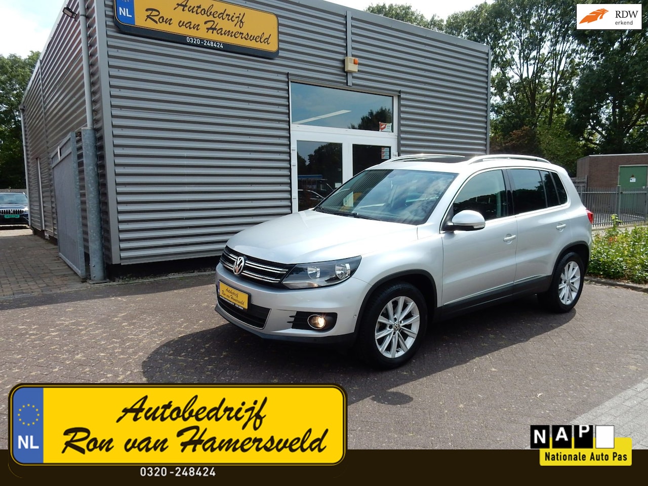 Volkswagen Tiguan - 1.4 TSI SPORT&STYLE*LEDER*PANODAK*TREKHAAK* - AutoWereld.nl