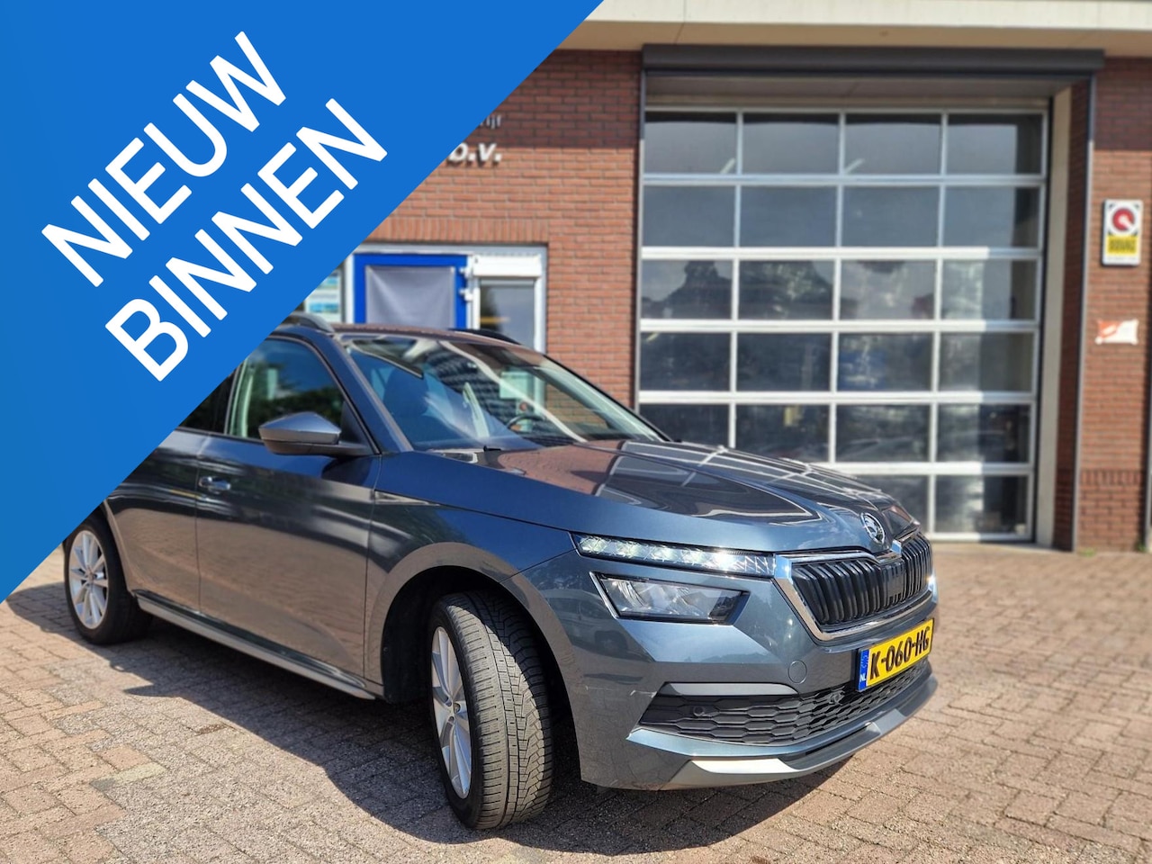 Skoda Kamiq - 1.0 TSI Business Edition | Cruise Control | Climate Control | Trekhaak | Camera | Parkeers - AutoWereld.nl
