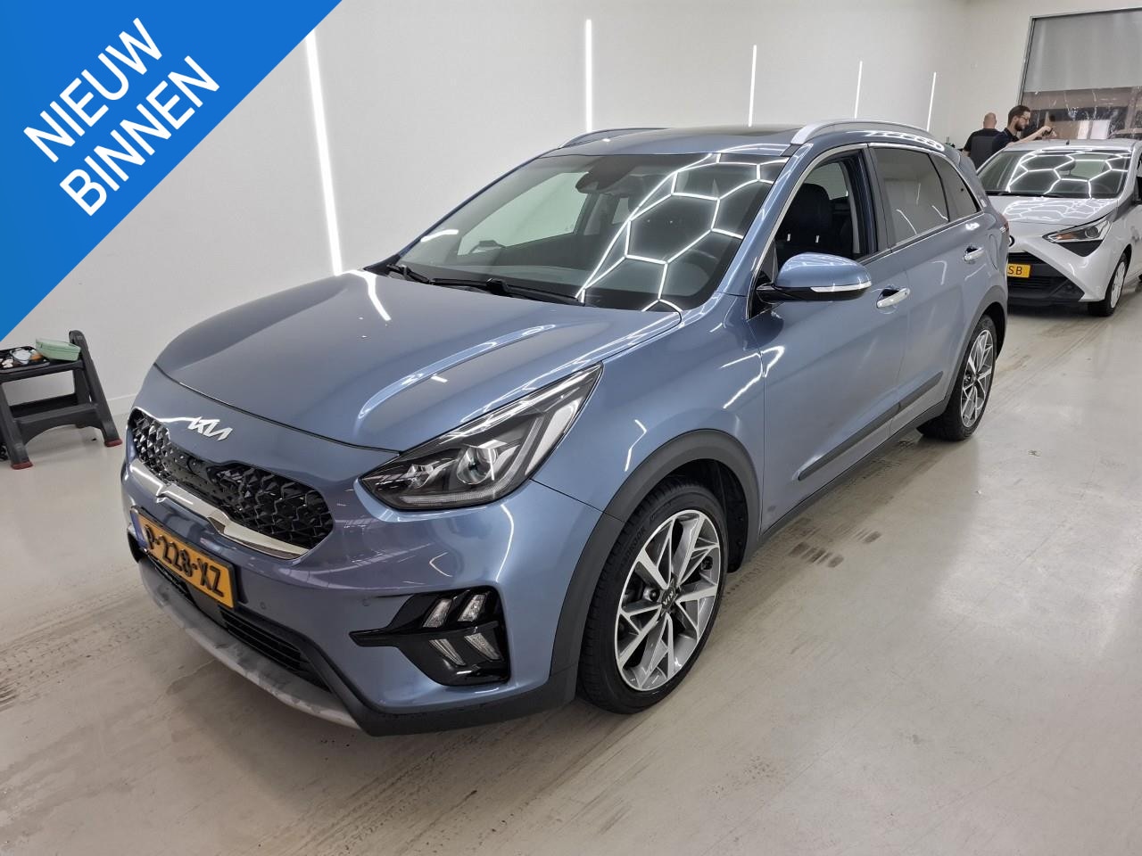 Kia Niro - 1.6 GDI HYBRID EXECUTIVELINE I AUTOMAAT I TREKHAAK I SCHUIF/KANTELDAK I LEDEREN BEKLEDING - AutoWereld.nl