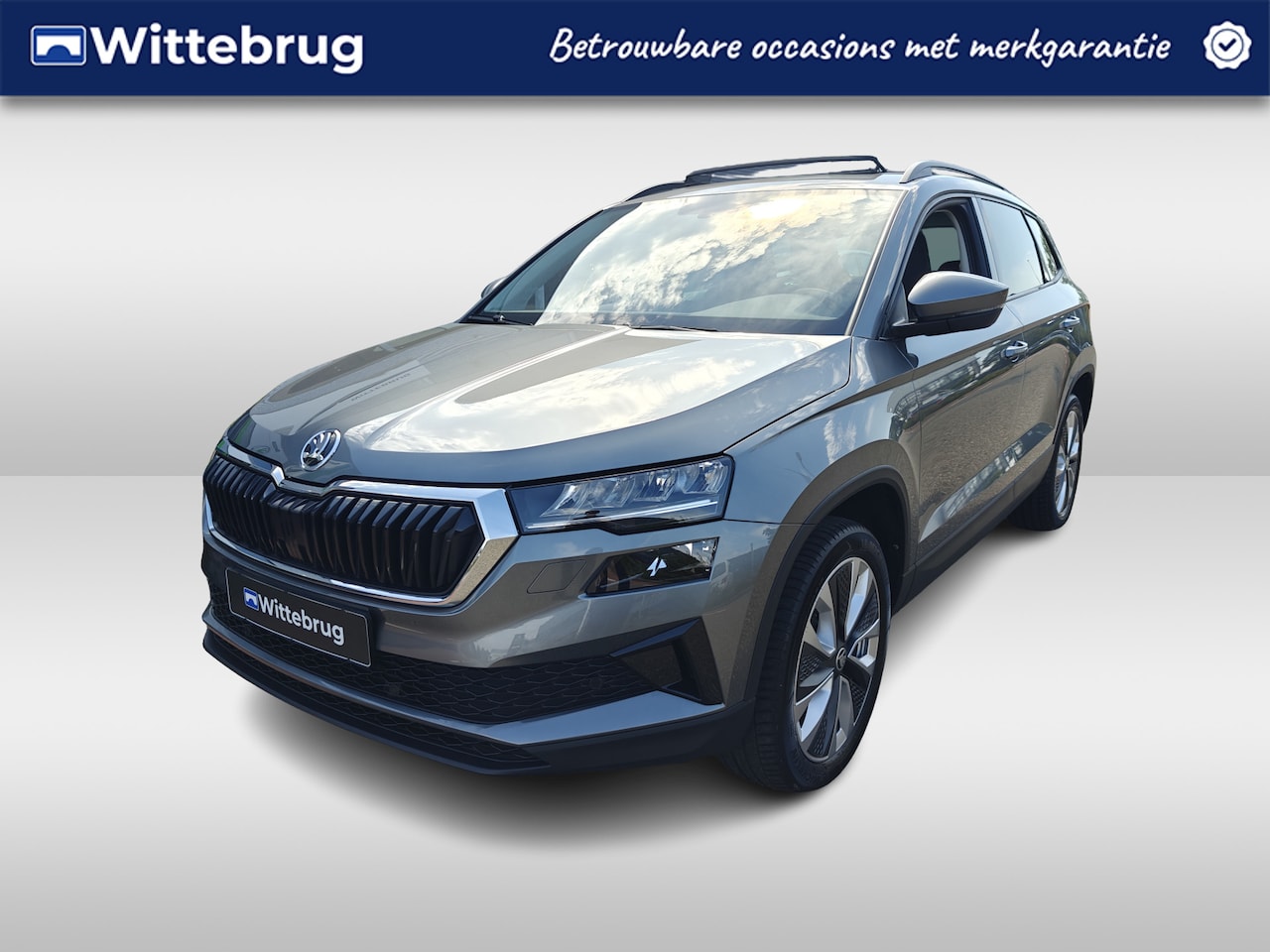 Skoda Karoq - 1.5 TSI ACT Style / Panoramadak / Trekhaak / Virtual Cockpit / Carplay / Verwarmbare stoel - AutoWereld.nl