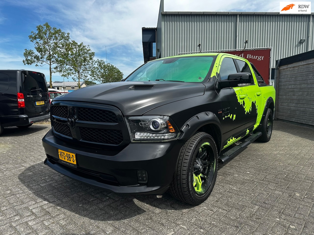 Dodge Ram 1500 - 5.7 V8 4x4 Quad Cab 6'4 Sport 5.7 V8 4x4 Quad Cab 6'4 Sport - AutoWereld.nl