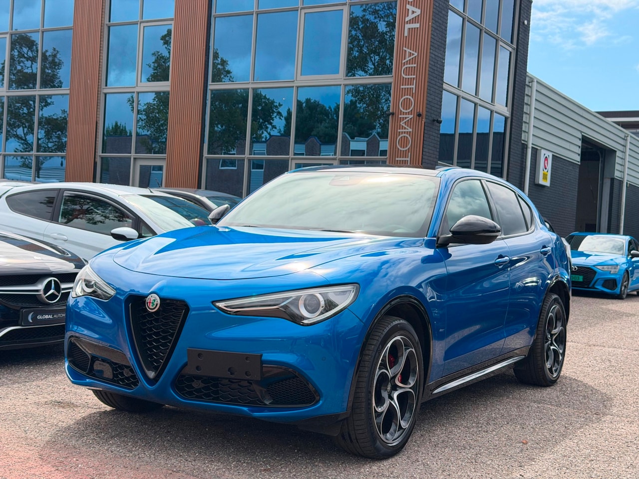 Alfa Romeo Stelvio - 2.0 T AWD Veloce - SCHUIFDAK - MISANO BLAUW - 20'' - LEER - SPORTSTOELEN - AutoWereld.nl