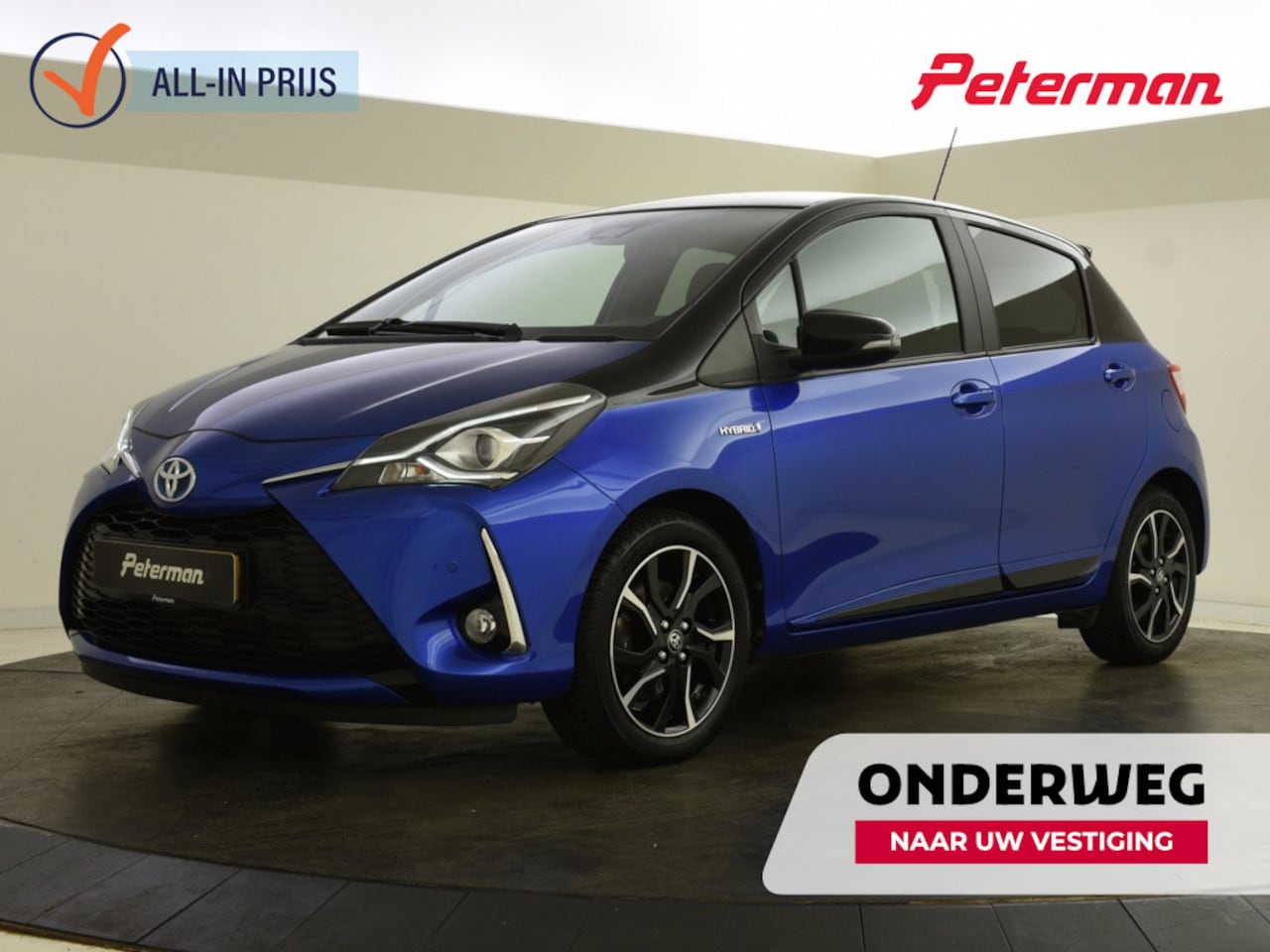 Toyota Yaris - 1.5 Hybrid Bi-Tone | PDC | Navigatie | - AutoWereld.nl