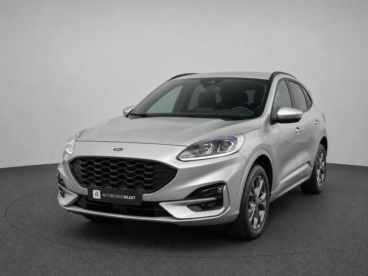 Ford Kuga - 2.5 PHEV ST-Line | Trekhaak | Camera | Navi | Carplay | LED | Solar Silver - AutoWereld.nl