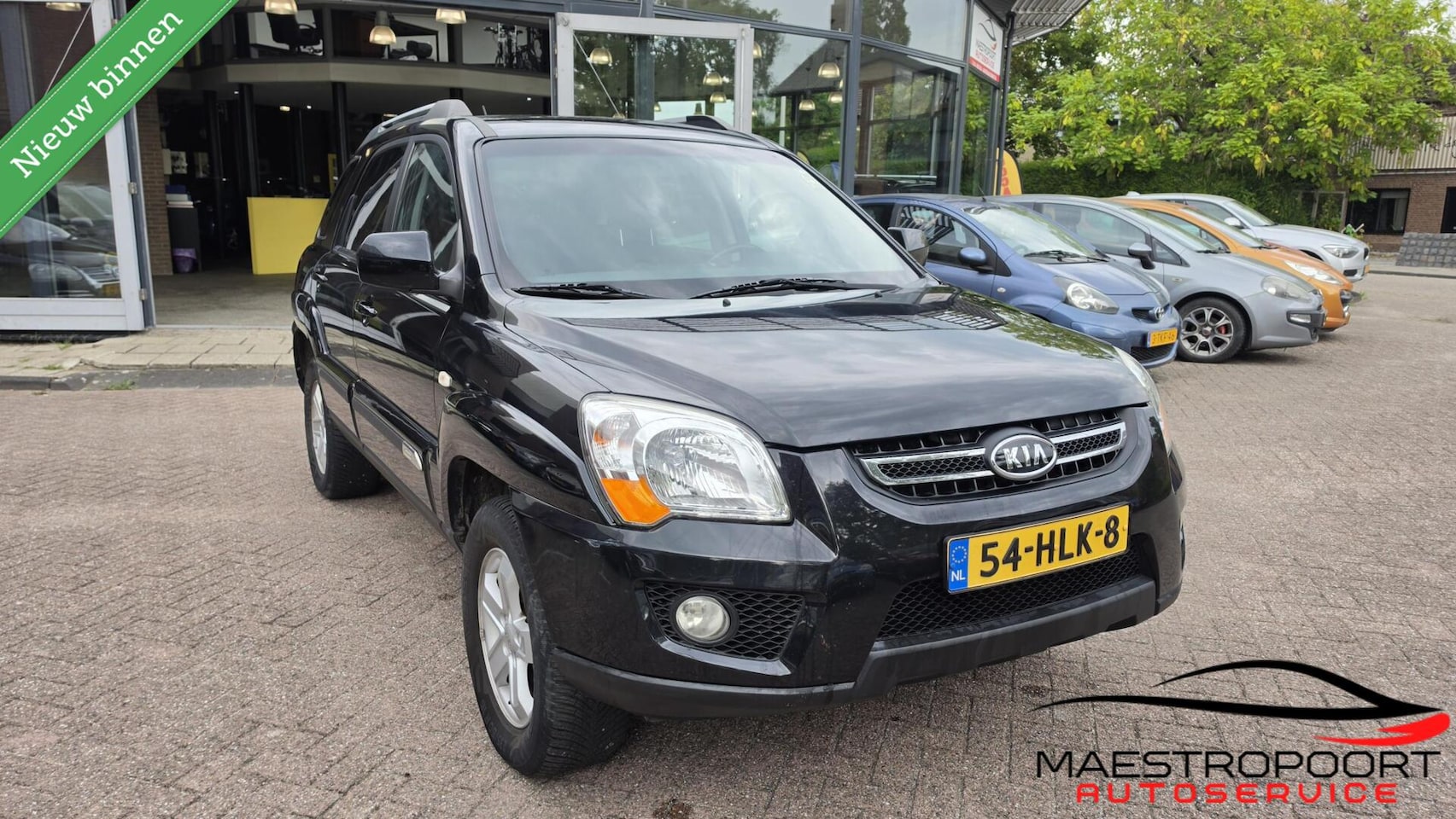 Kia Sportage - 2.0 CVVT X-clusive 2.0 CVVT X-clusive - AutoWereld.nl