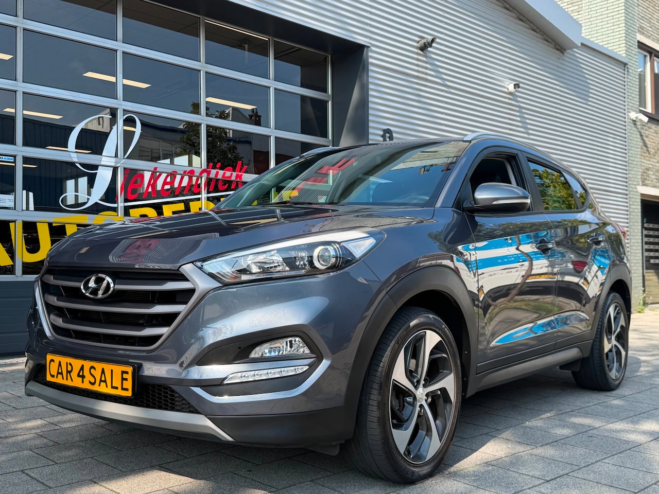 Hyundai Tucson - 1.6 T-GDi Premium 177PK - Navigatie I Leer I Airco I 19 inch Sport velgen I LED I PDC & Ca - AutoWereld.nl