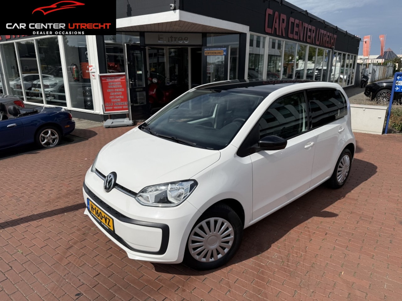 Volkswagen Up! - 1.0 up! Black&White Edition airco 5drs nette up - AutoWereld.nl