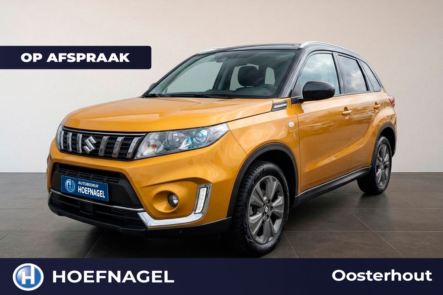 Suzuki Vitara - 1.4 Boosterjet Comfort Smart Hybrid | Adaptive Cruise | Stoelverwarming | CarPlay | Camera - AutoWereld.nl