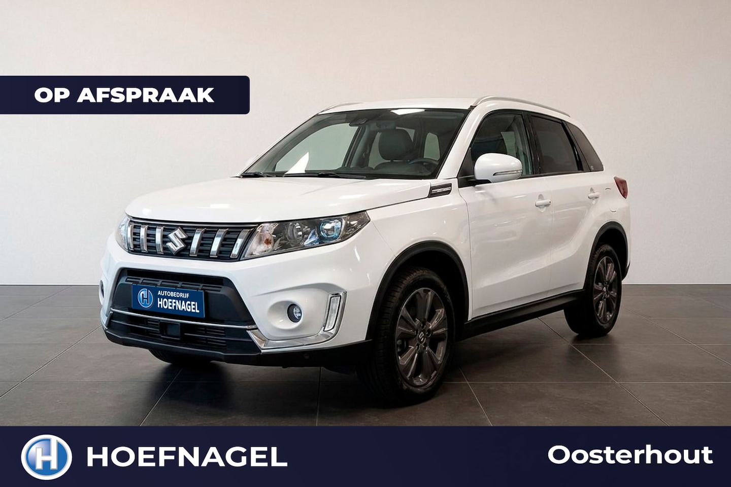 Suzuki Vitara - 1.4 Boosterjet Comfort Smart Hybrid | Adaptive Cruise | Stoelverwarming | CarPlay | Camera - AutoWereld.nl