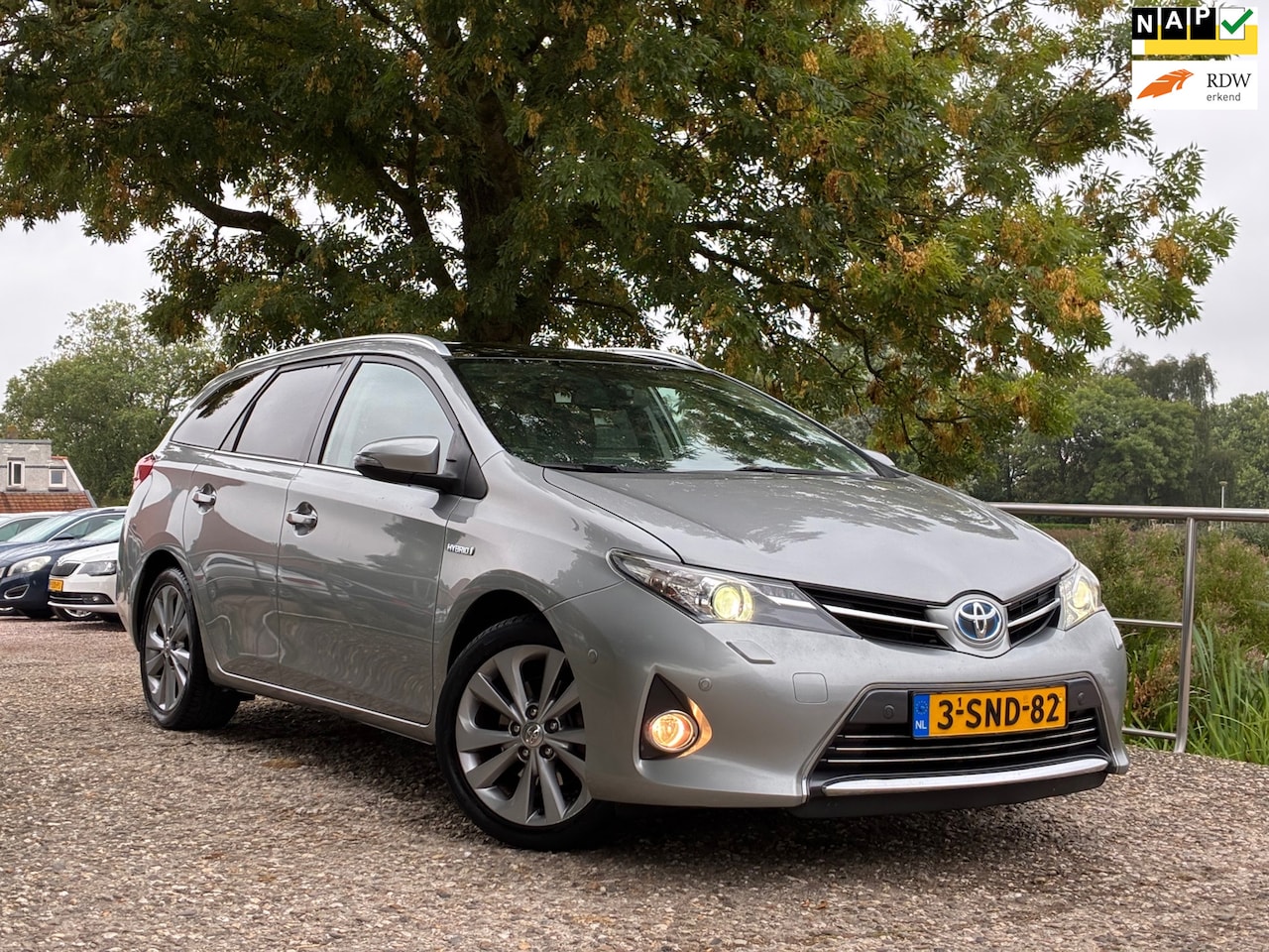 Toyota Auris Touring Sports - 1.8 Hybrid Lease Pro | Panodak + Navi + Clima nu €6.975,-!! - AutoWereld.nl