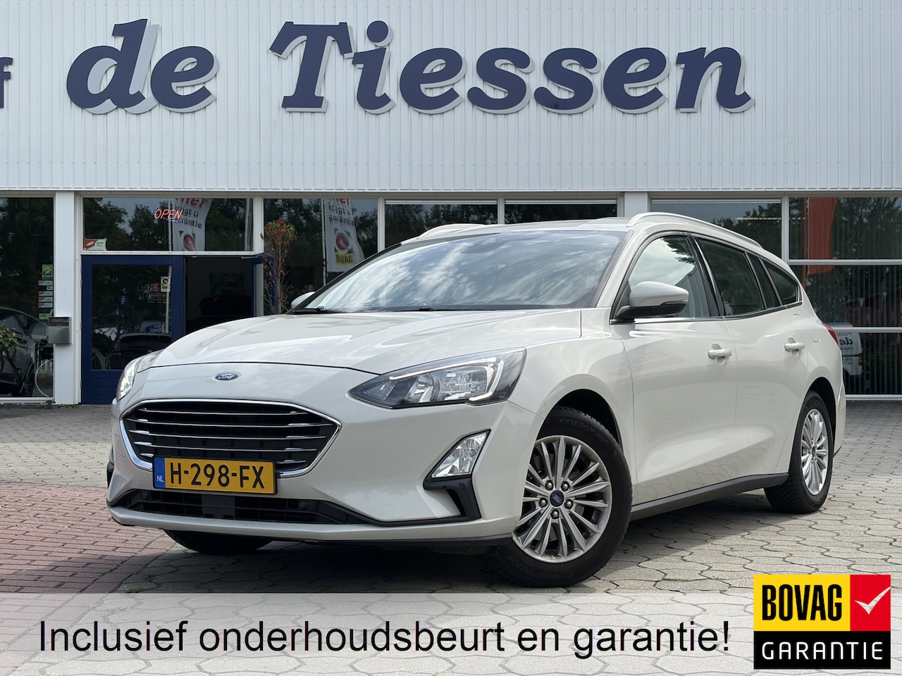 Ford Focus Wagon - 1.0 EcoBoost Titanium Business | PDC | Navi | Trekhaak | Rijklaar met beurt & garantie! - AutoWereld.nl