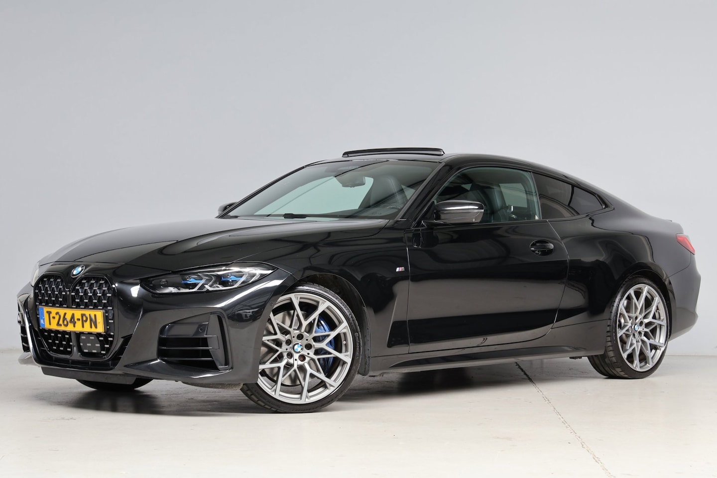 BMW 4-serie Coupé - M440i xDrive M-sport | schuifkanteldak | laser led | M Seats | 360 camera | harmankardon | - AutoWereld.nl