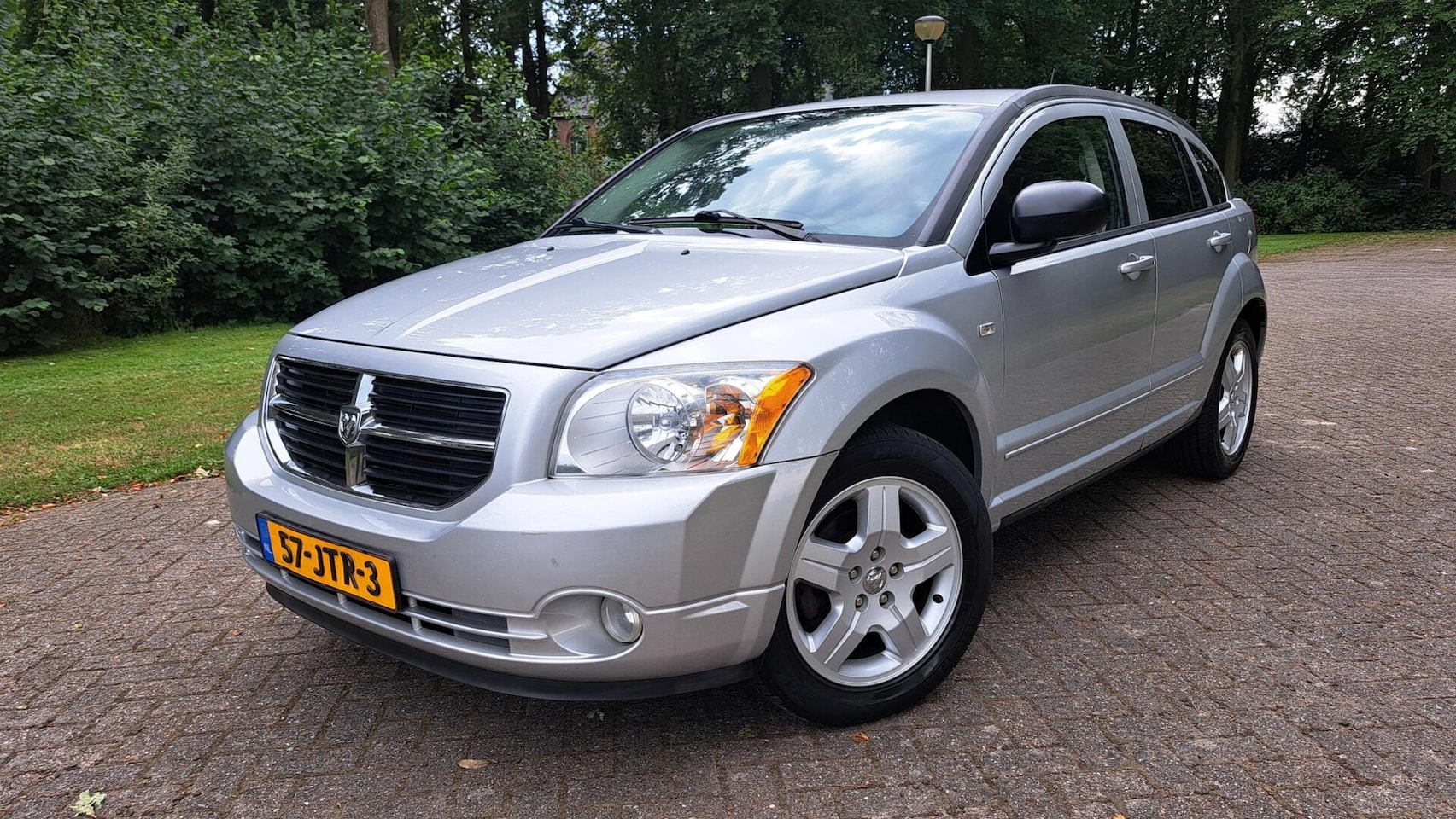 Dodge Caliber - 2.0 SXT AUT. AIRCO CRUISE ELEK.RAMEN HOGE ZIT - AutoWereld.nl
