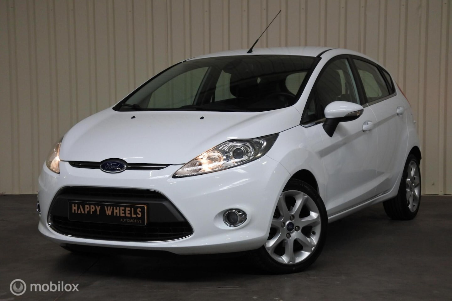 Ford Fiesta - I 1.25 I Titanium I Airco I Cruise I Parkeerhulp - AutoWereld.nl