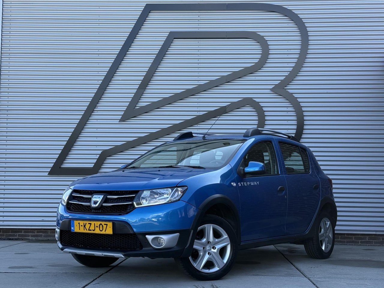 Dacia Sandero Stepway - 0.9 TCe Lauréate Navi|Airco|Cruise|PDC|Trekhaak|D-riem vv in 2021|N.A.P|Nieuwe APK bij Afl - AutoWereld.nl