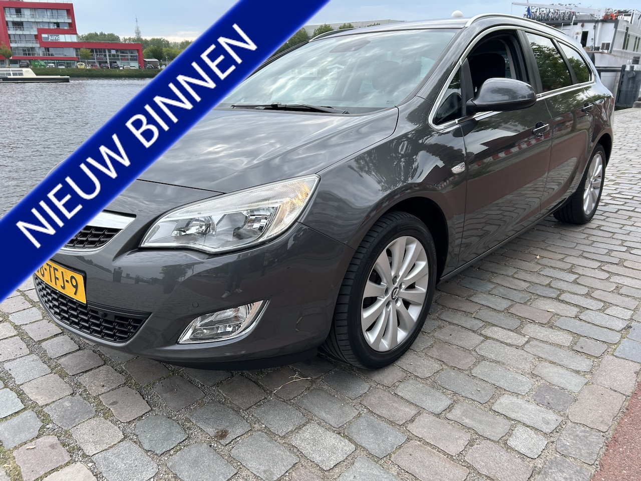 Opel Astra Sports Tourer - 1.4 Turbo Cosmo navigatie airco/ecc apk - AutoWereld.nl