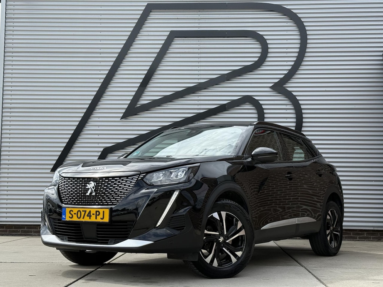 Peugeot 2008 - 1.2 PureTech Allure 1e Eigenaar|Navi|Camera|i-Cockpit|Clima|Cruise|Stoelverwarming|Carplay - AutoWereld.nl