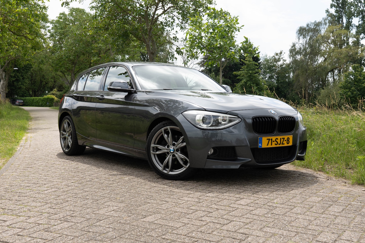 BMW 1-serie - 118i Business BMW 118i F20 | Dealer | 180 d/km | 18" | M Sport 135 look - AutoWereld.nl