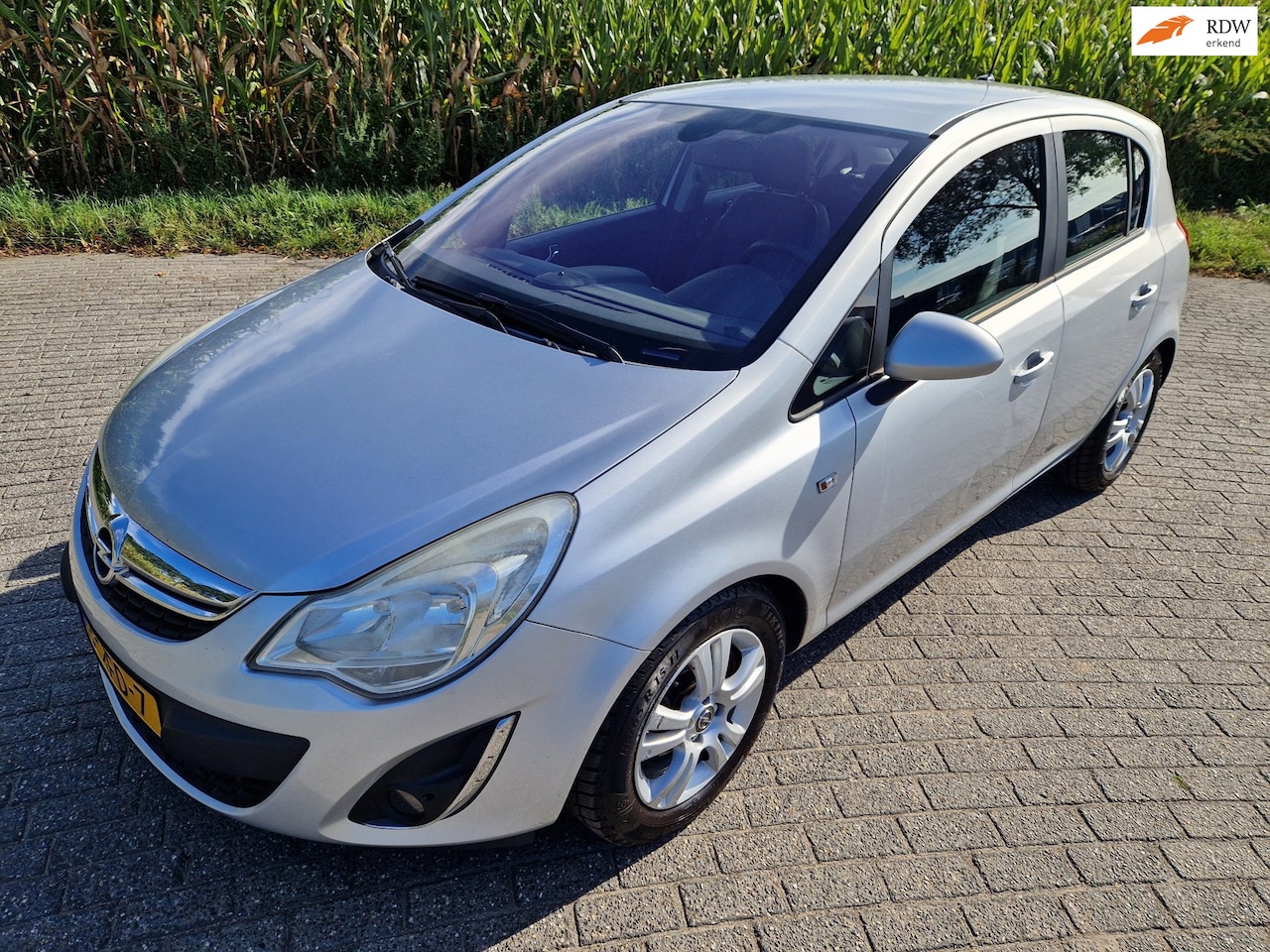 Opel Corsa - 1.3 CDTi EcoFlex S/S Anniversary Edition ziet er heel netjes uit loopt goed - AutoWereld.nl