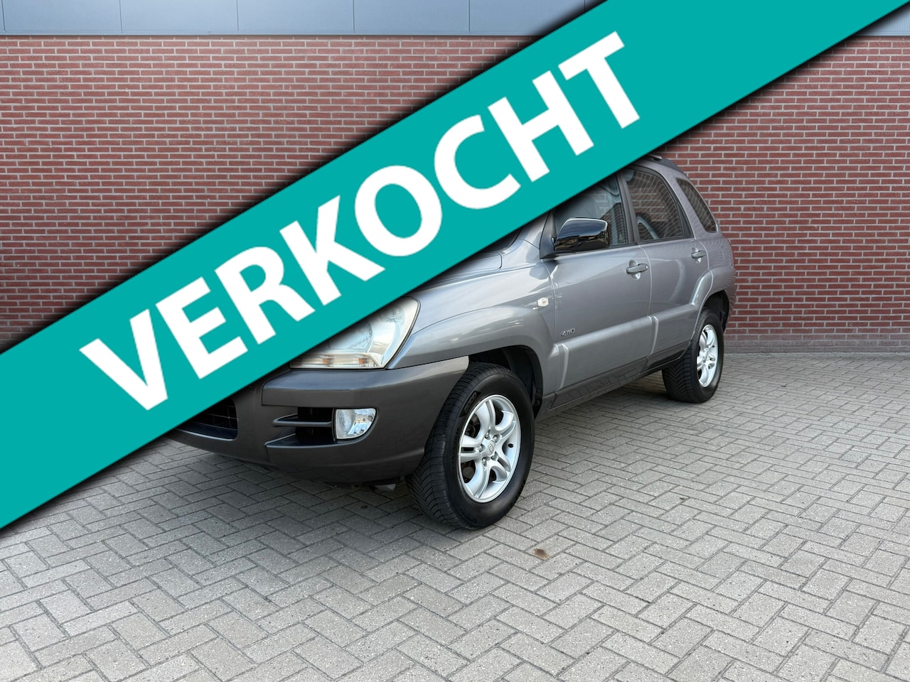 Kia Sportage - 2.7 V6 Adventure 4WD / Nap / Airco / Cruise / Trekhaak - AutoWereld.nl