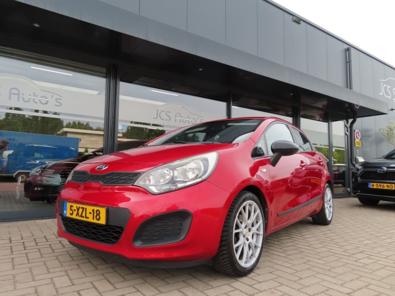 Kia Rio - 1.2 CVVT Airco Cruise 17 Inch Wielen Trekhaak 2014 - AutoWereld.nl