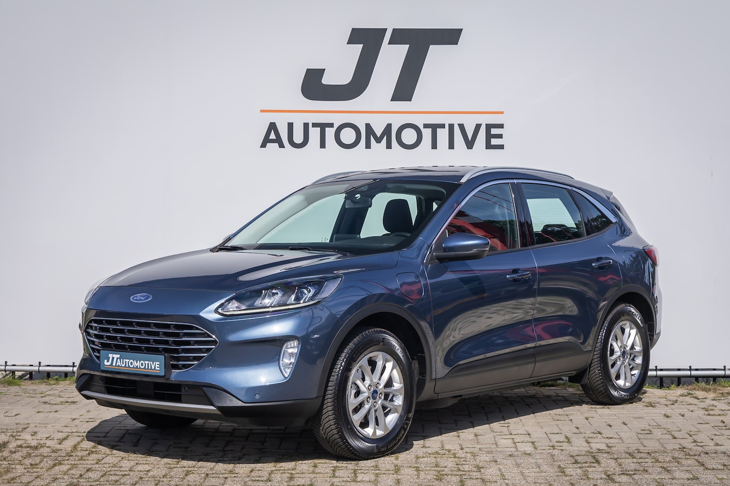 Ford Kuga - 2.5 PHEV Titanium plug in hyb Camera | Voorruitverwarming | Pdc | Carplay | Cruise control - AutoWereld.nl