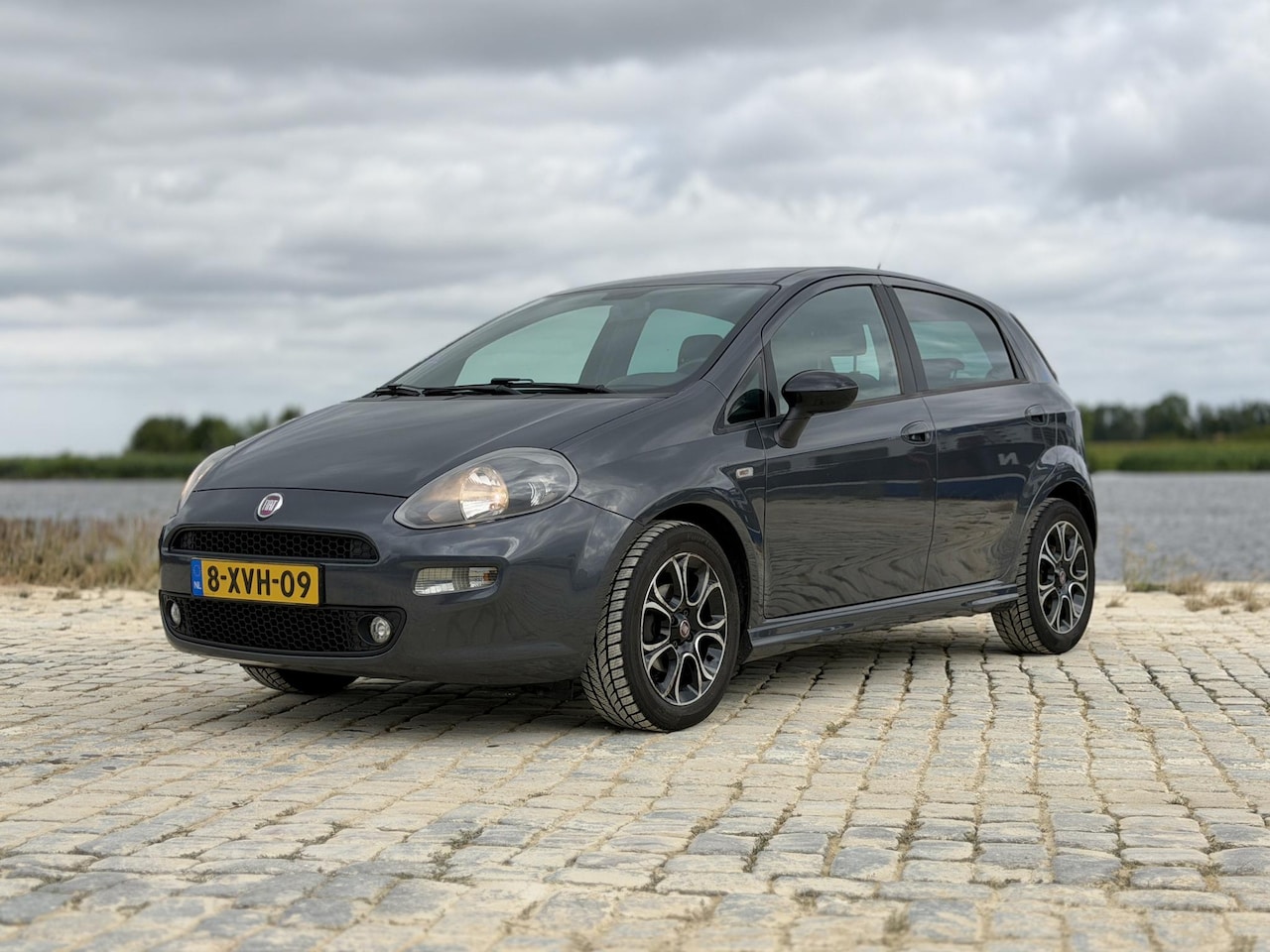 Fiat Punto Evo - 0.9 TwinAir Racing|Cruise|Airco|LM 16" - AutoWereld.nl