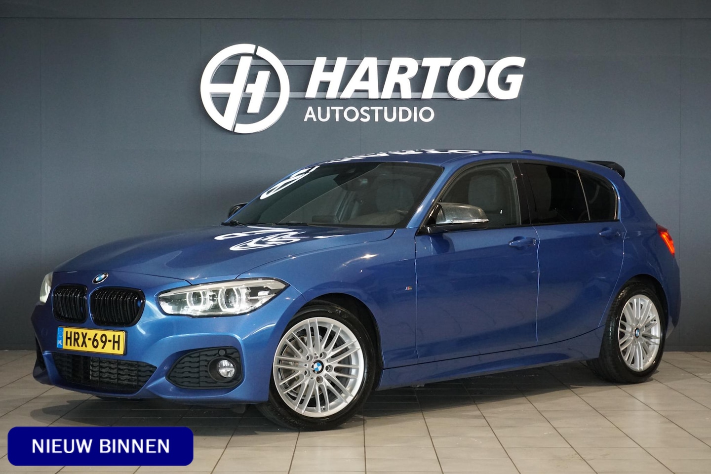 BMW 1-serie - 118i High Executive M Sport + CAMERA | HARMAN/KARDON | SPORTSTOELEN | LED - AutoWereld.nl