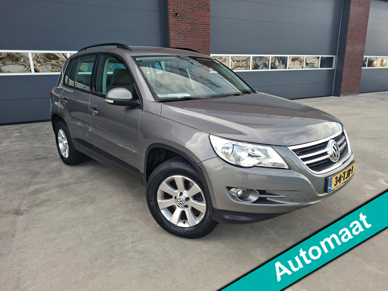 Volkswagen Tiguan - 2.0 TSI Sport&Style 4Motion Automaat - AutoWereld.nl