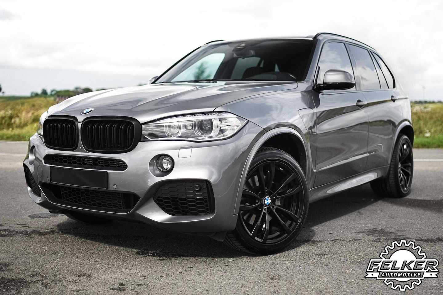 BMW X5 - 40e M Sport Pano HUD Harman Kardon Trekhaak 360° LED - AutoWereld.nl
