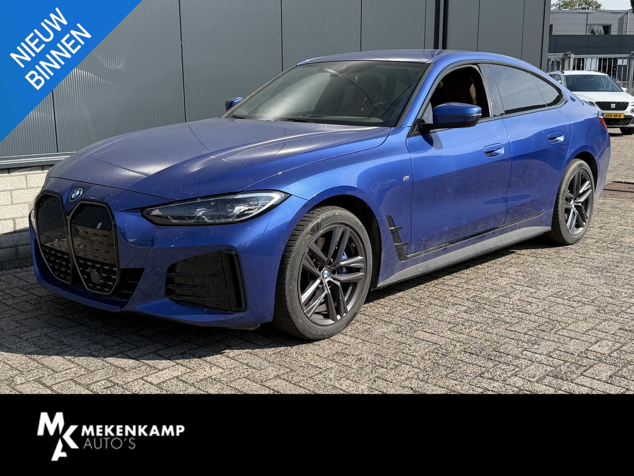 BMW i4 - eDrive40 High Executive 84 kWh M Sport 18"/SOH 100%/Lederen M-stoelen + memory/Head-up/Ada - AutoWereld.nl