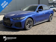 BMW i4 - eDrive40 High Executive 84 kWh M Sport 18"/SOH 100%/Lederen M-stoelen + memory/Head-up/Ada