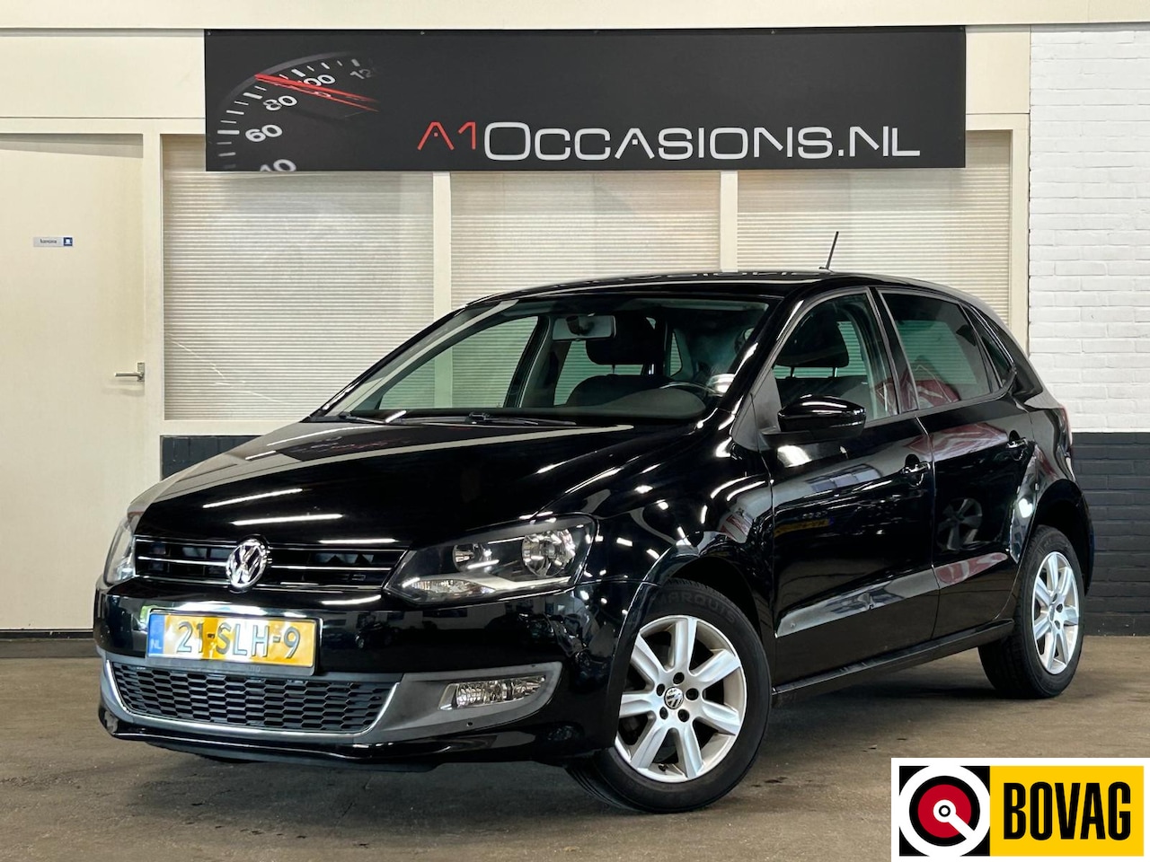 Volkswagen Polo - 1.2 TSI Highline + NAVI - AutoWereld.nl