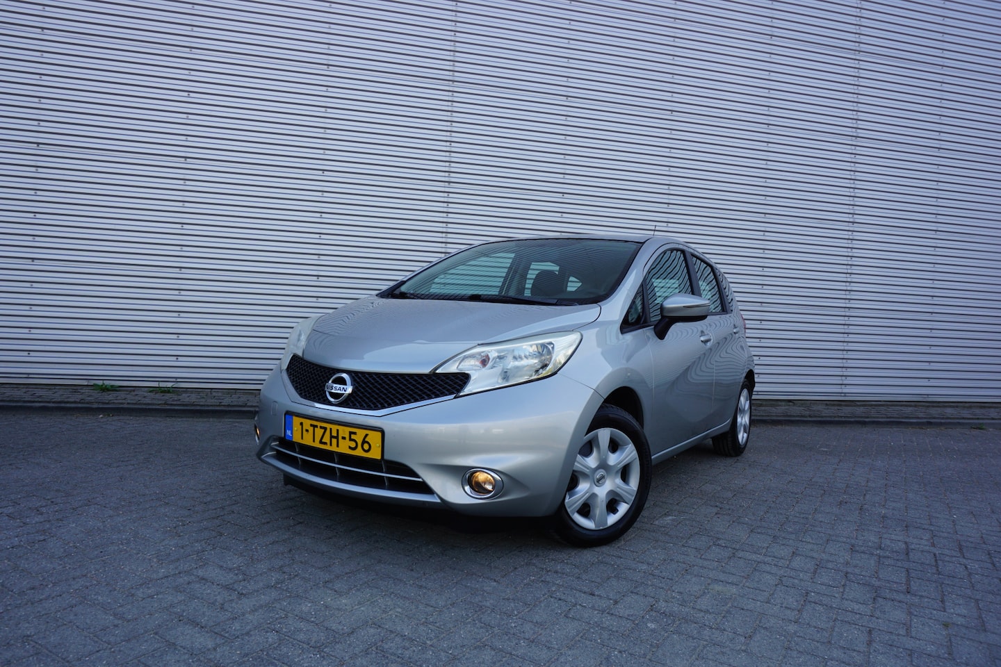 Nissan Note - 1.2 Acenta 1e Eigenaar - Airco / Cruise / Elektr. ramen / NAP - AutoWereld.nl