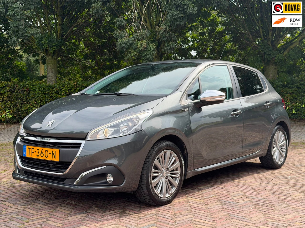 Peugeot 208 - 1.2 PureTech Style 1.2 PureTech Style, Navi, Parkeersensor, Airco, Cruise Control - AutoWereld.nl