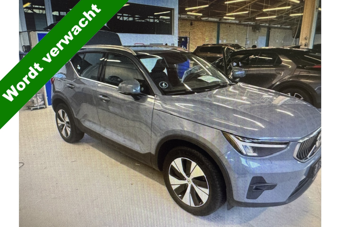 Volvo XC40 - 1.5 T4 Plug-in 211 PK hybrid Ultimate Bright | Thunder Grey | Clima en Charcoal Leather pa - AutoWereld.nl