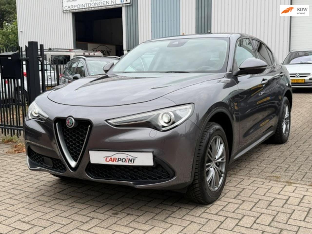 Alfa Romeo Stelvio - 2.0 T AWD Q4 200PK Leer Navi Trekhaak Keyless! - AutoWereld.nl