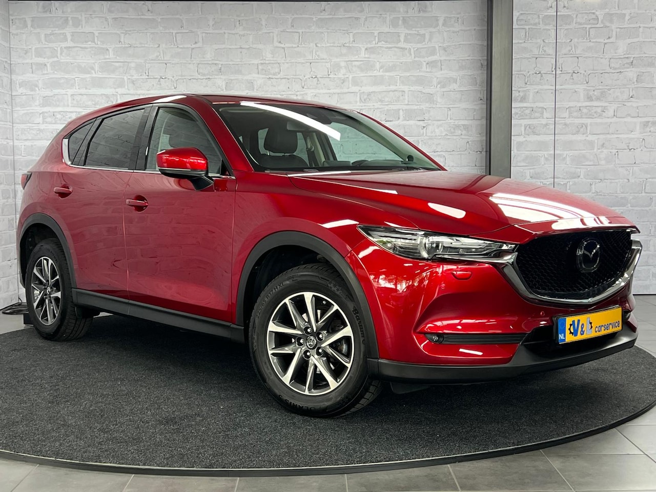 Mazda CX-5 - 2.5 4WD SkyActiv-G 194 Luxury Pano HUD Trekhaak BOSE Soul Red - AutoWereld.nl