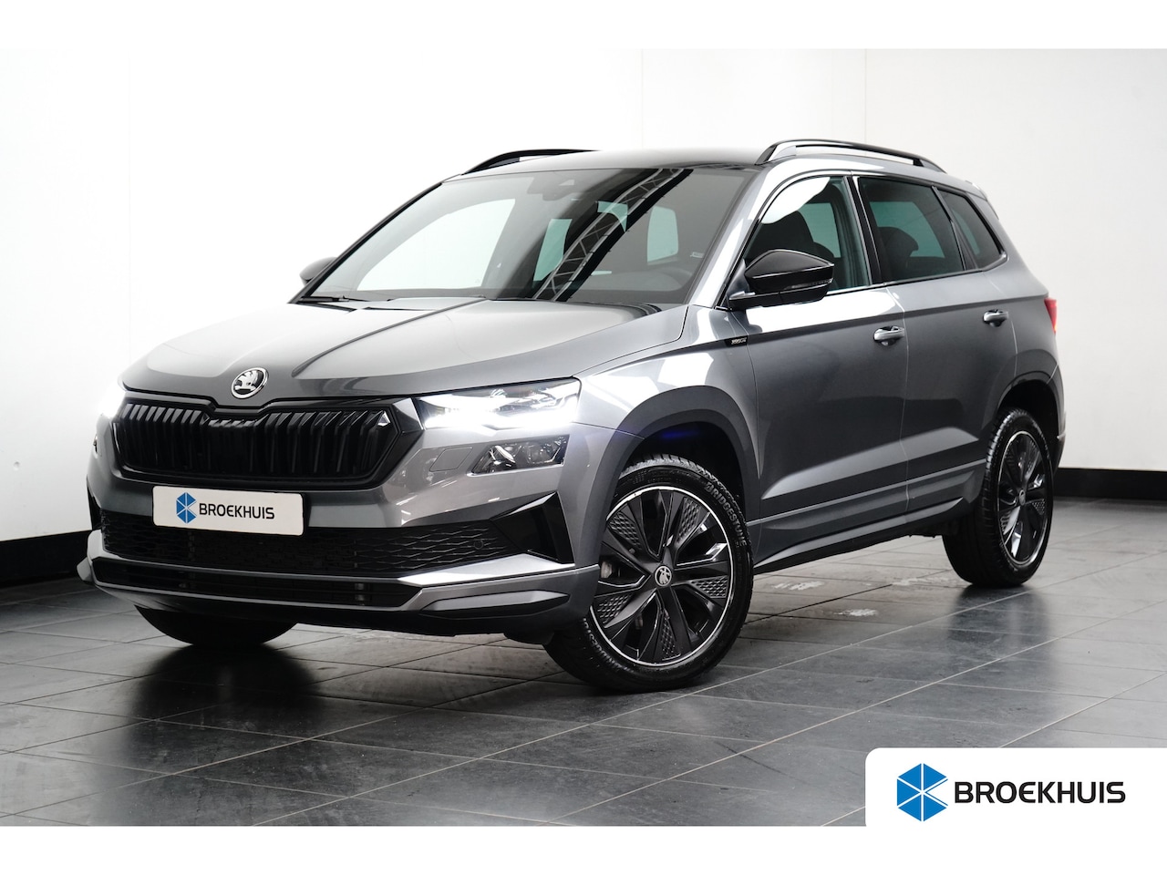 Skoda Karoq - 1.5 TSI 150PK DSG-7 Sportline | NAVIGATIE | ADAPT. CRUISE | CAMERA | ELEKTR. A. KLEP | MAT - AutoWereld.nl